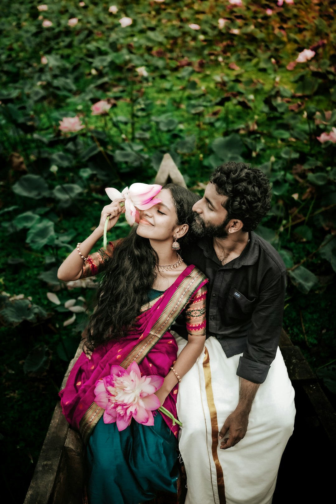 A kiss on the cheek, lotus in hand